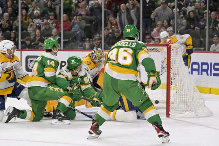 Mar 10, 2024; Saint Paul, Minnesota, USA; Minnesota Wild forward Kirill Kaprizov (97) scores a power play goal against the Nashville Predators during the second period at Xcel Energy Center.